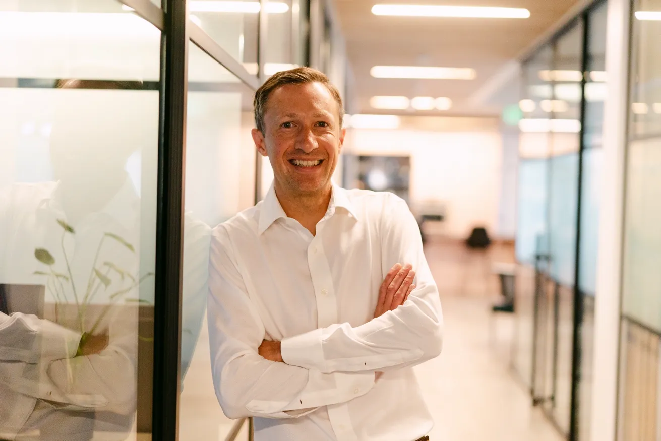 Paul Johnson arms crossed, smiling