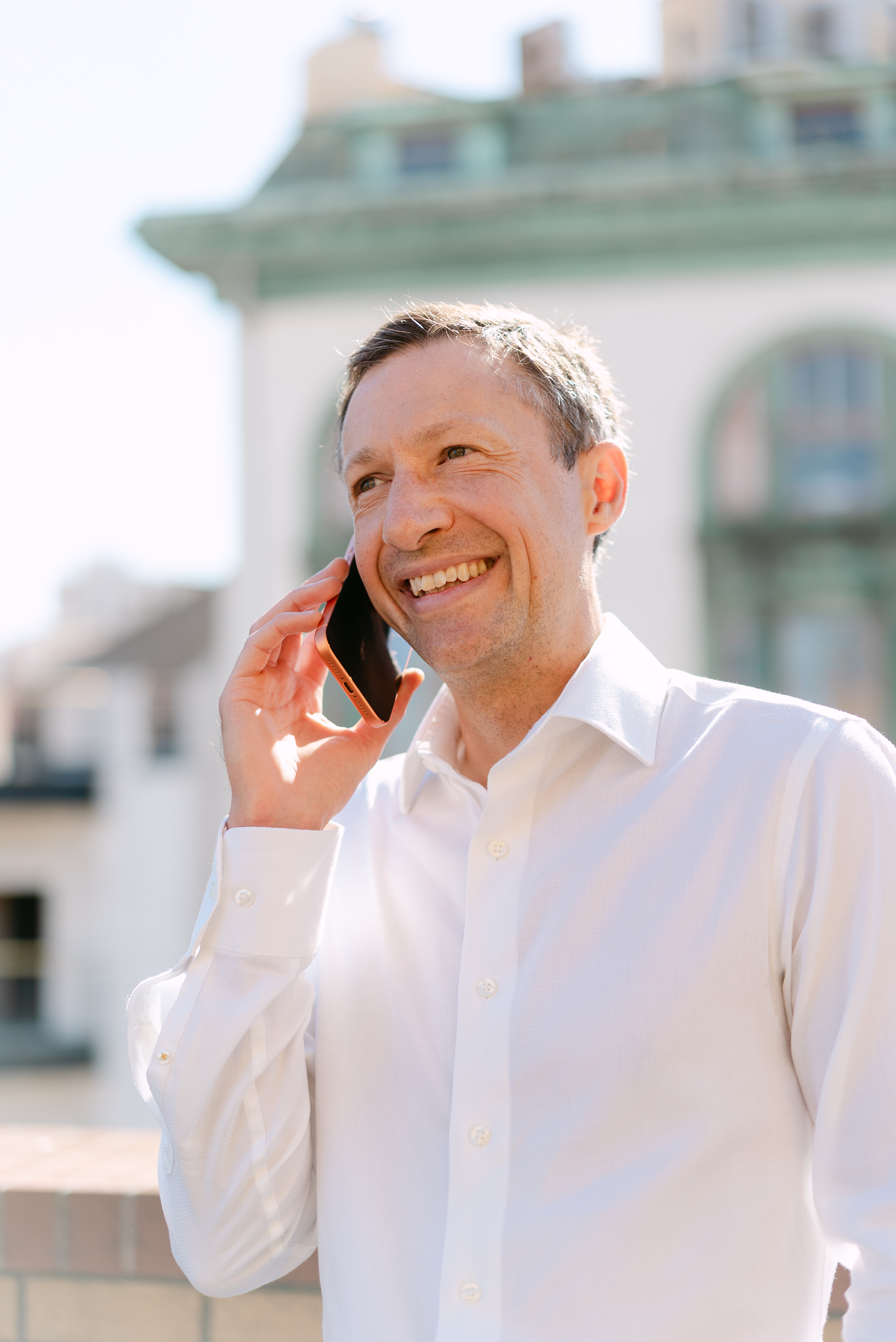 Paul Johnson on a phone call outdoors in San Francisco